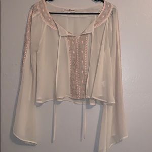 Cream crop top.